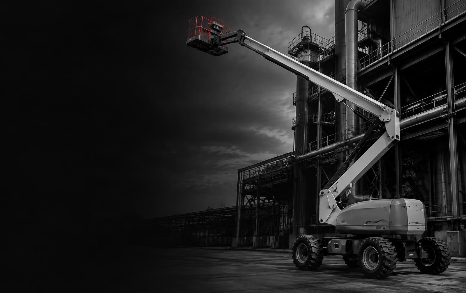 Plataforma articulada com braço elevado em uma planta industrial
